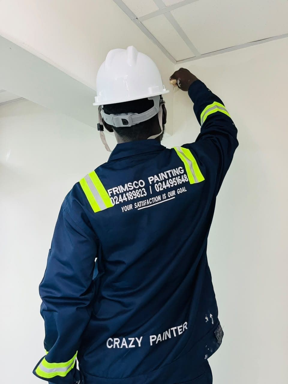 Frimsco Painting professional cutting in paint at a ceiling corner