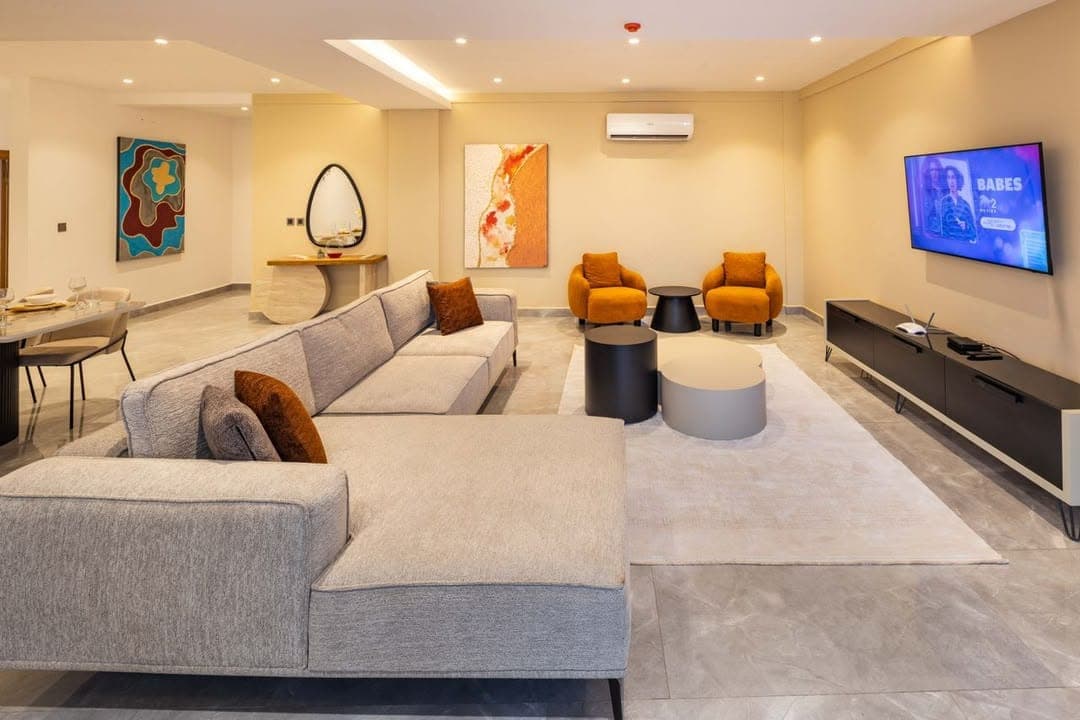 Completed modern living room with warm neutral painted walls and ceiling